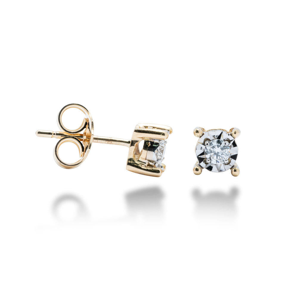 ORECCHINI PUNTO LUCE IN ORO 18 KT CON DIAMANTI